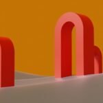 a group of red objects sitting on top of a desert