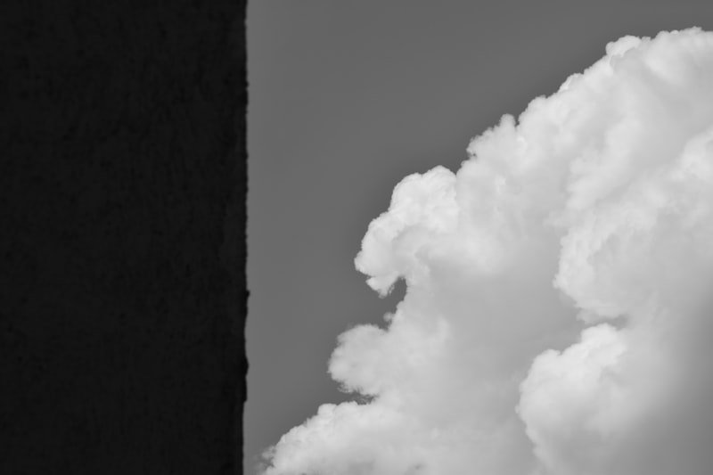 A black and white photo of clouds in the sky